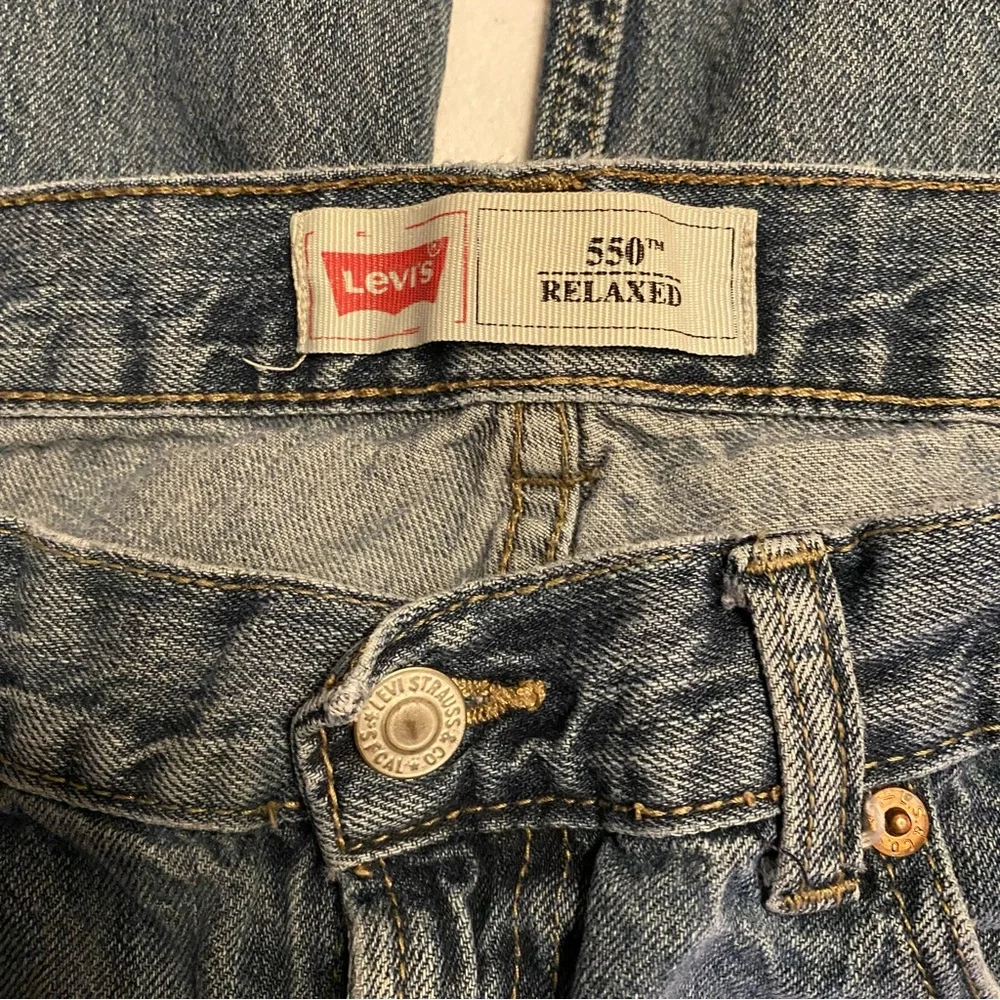 Levi’s 550 red tab blue jeans size 10 husky, 30 inch waist 25 inch inseam.